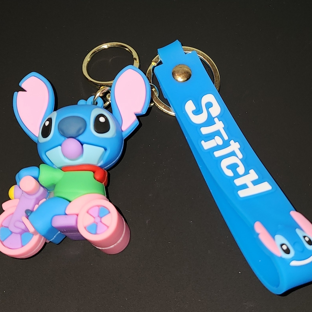 Disney Stitch Riding Scooter Keychain Purse Charm Blue and Pink